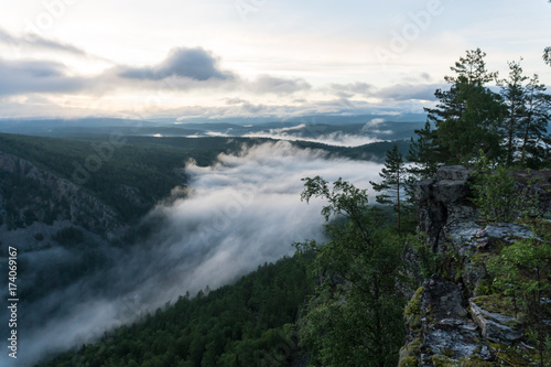 Sunset in the Ural mountains in Karatash ridge. Flying by drone