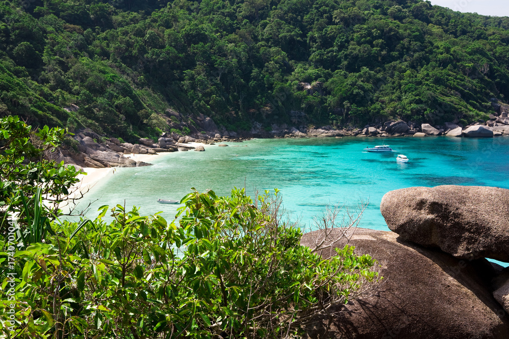 Beautiful sea landscape with tropical coast and the high-speed boat at Tachai island, Phang nga, Thailand