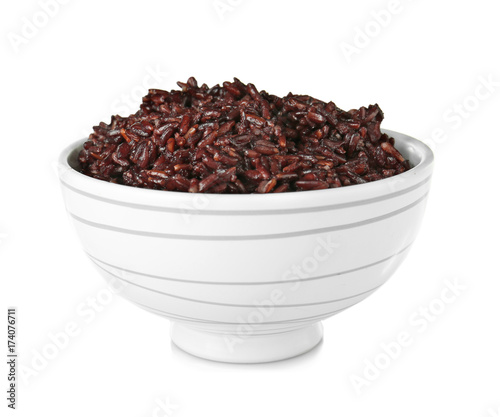Bowl with brown rice, isolated on white