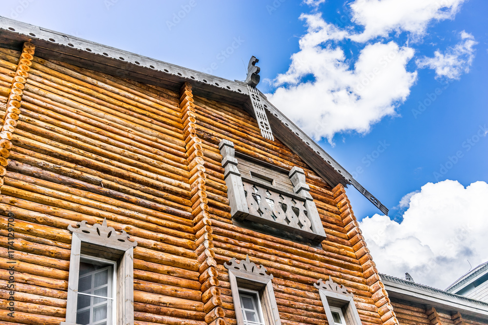 wooden building in the national color on the background of blue sky