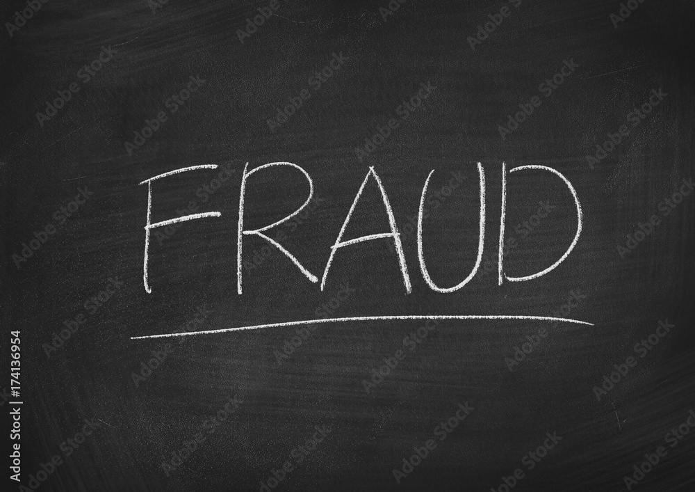 Fototapeta premium fraud concept word on a blackboard background