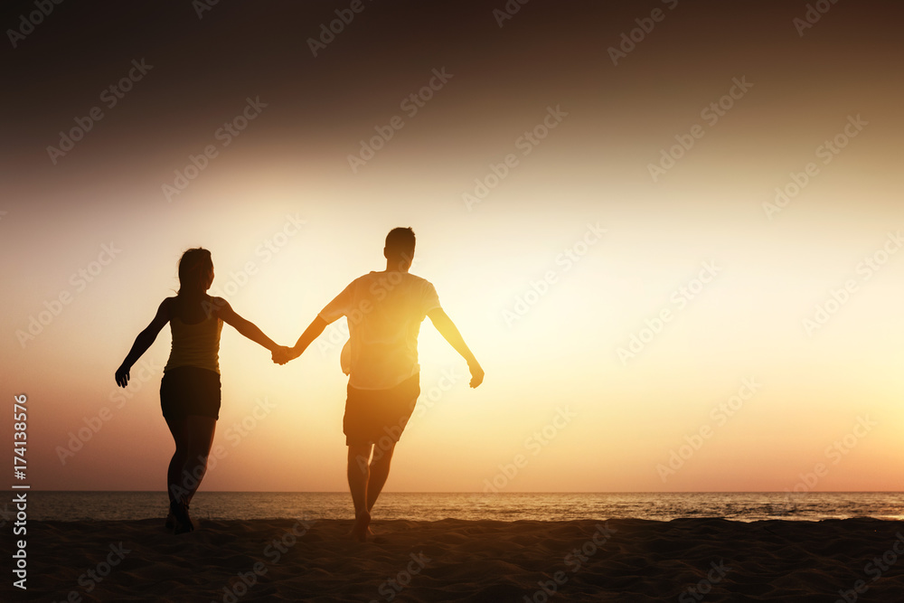 Happy couple sea beach run