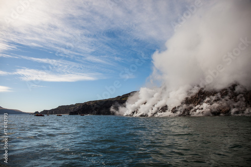 boats watching Snow volcano activity, Chirpoy Island, Russia