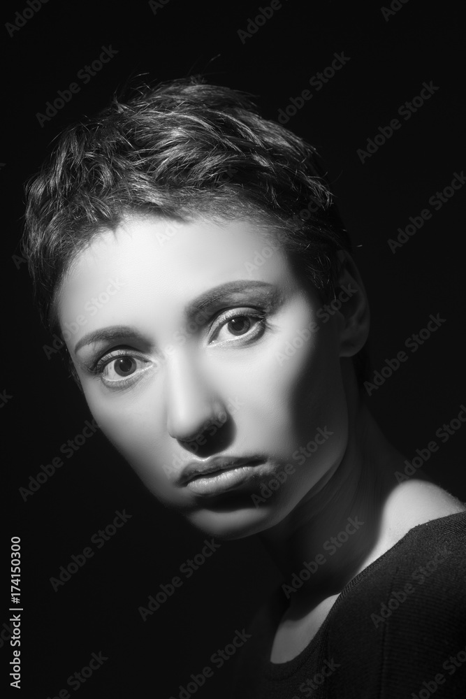 brunette girl on a black background

