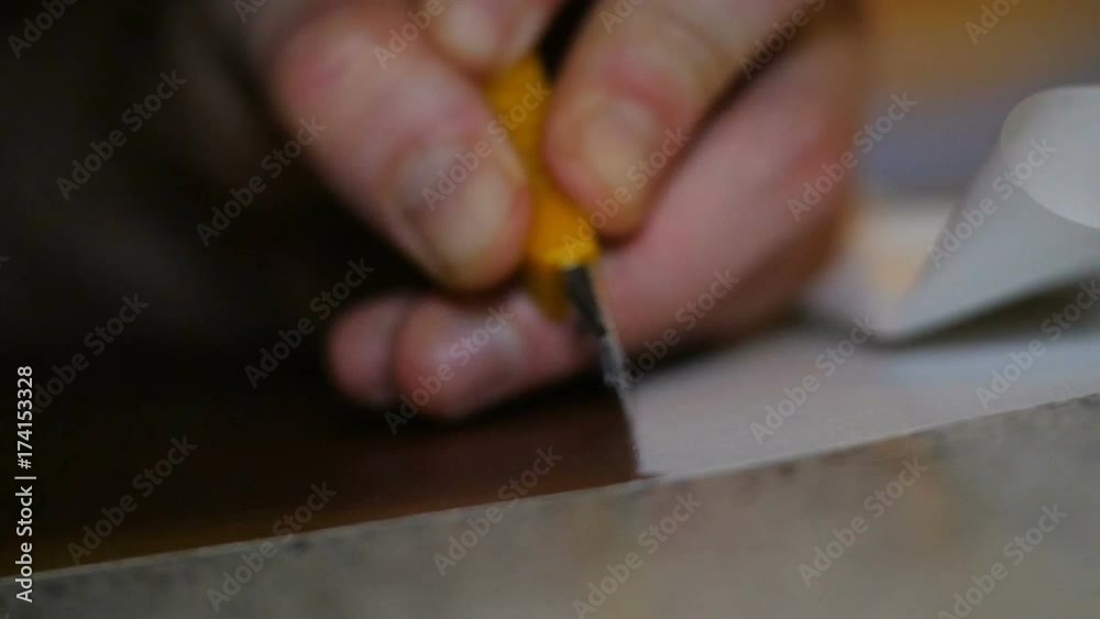 Slow Motion Worker Cuts Off Floor Covering with Knife Slow Motion Worker Cuts Off Floor Covering with Knife
