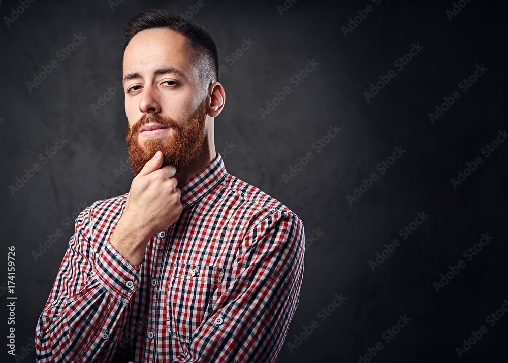 Thoughtful redhead bearded hipster male. Thoughtful redhead bearded hipster male.