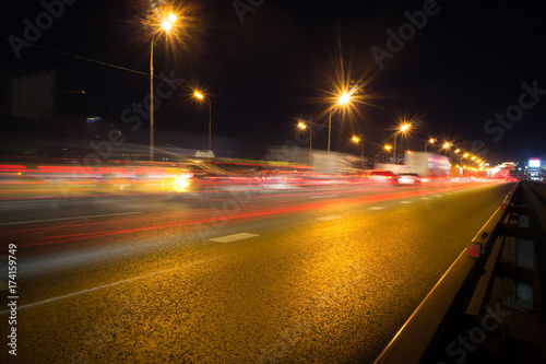 Speed motion,abstract background rays.Traffic car lights on road.