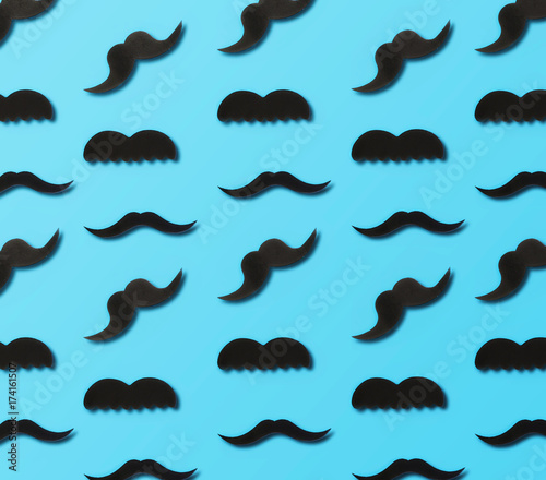 Father s Day concept. Paper mustache on blue background  top view