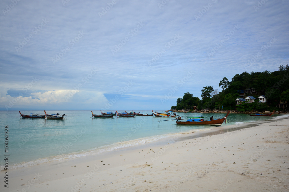 Tropical white sand and blue sea with blue sky at Andaman Sea. Lipe Island, Satun, Thailand.