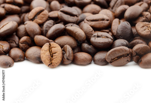 close up of coffee beans isolated on white background