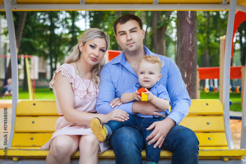 Fototapeta premium happy family walking in park