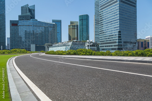 urban traffic road with cityscape in background in Shanghai China..