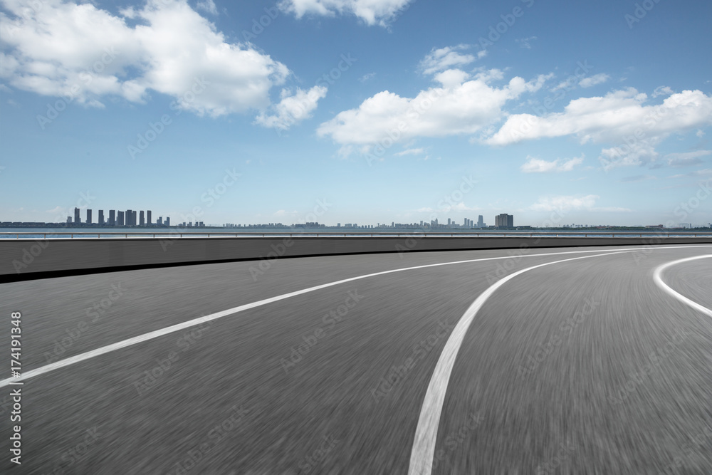 urban traffic road with cityscape in background in Shanghai,China.. urban traffic road with cityscape in background in Shanghai,China..