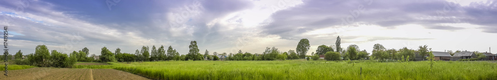 Beautiful rural landscape and cumulus cloudy blue sky high above