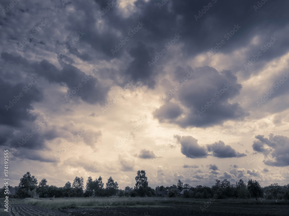 Beautiful rural landscape under cumulus cloudy sky