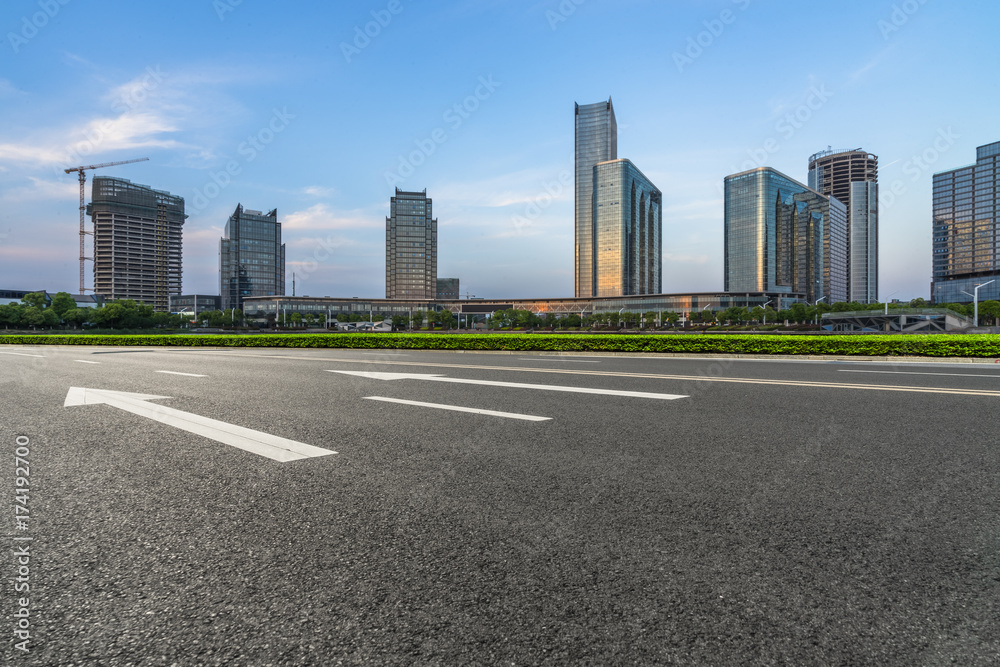urban traffic road with cityscape in background in Shanghai,China..