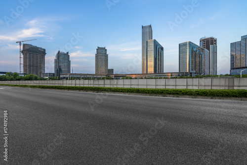 urban traffic road with cityscape in background in Shanghai,China.. © hallojulie