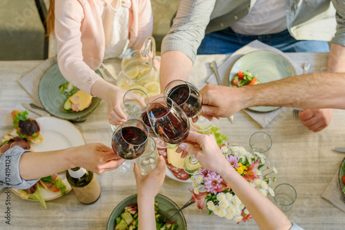 family clinking glasses