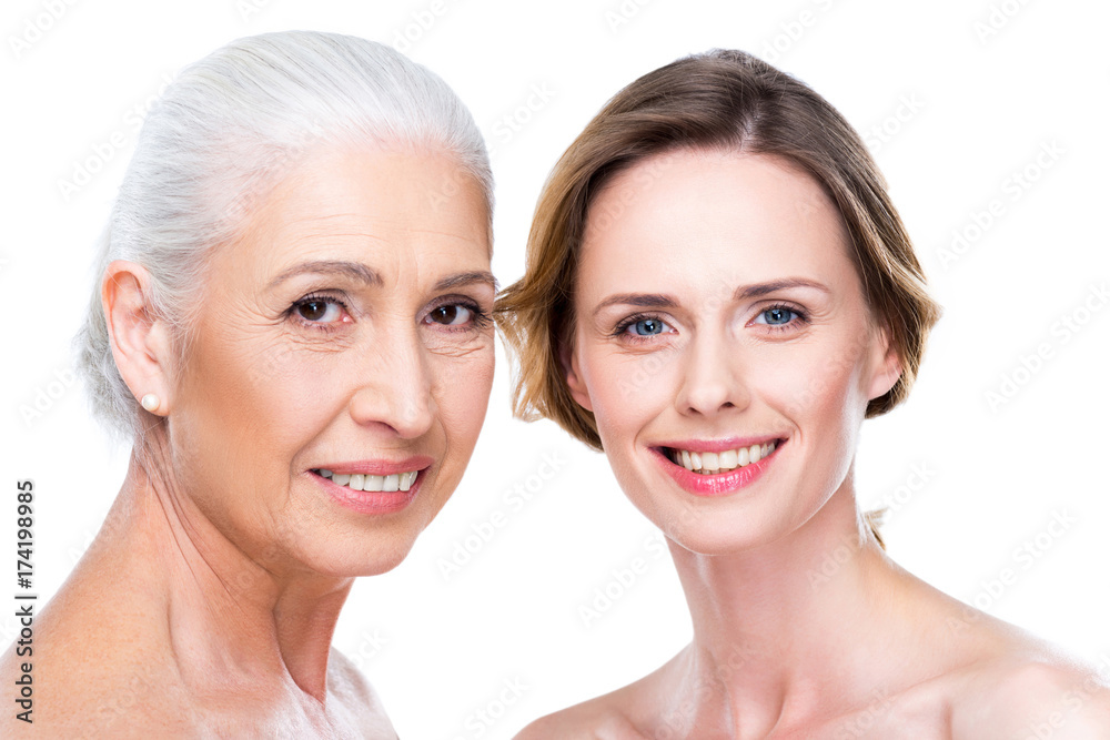 smiling adult daughter and mother smiling adult daughter and mother