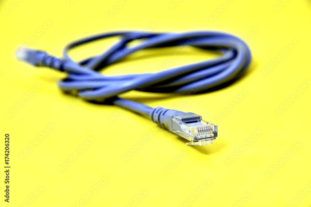 Cable network connection isolated on a white background. An Ethernet RJ45 cable Cable network connection isolated on a white background. An Ethernet RJ45 cable