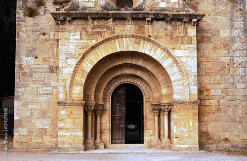 Iglesia romanica en el pueblo de Porqueres del siglo XII en Girona Cataluña España photo
