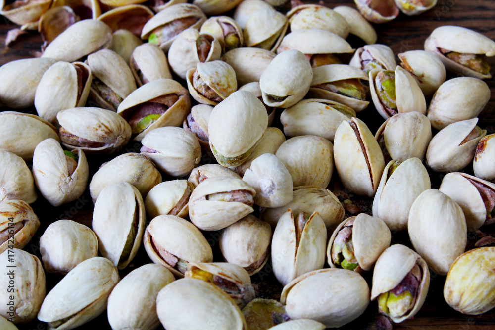 a lot pistachios on the table
