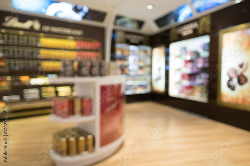 The blurry scene of the duty free shop in airport