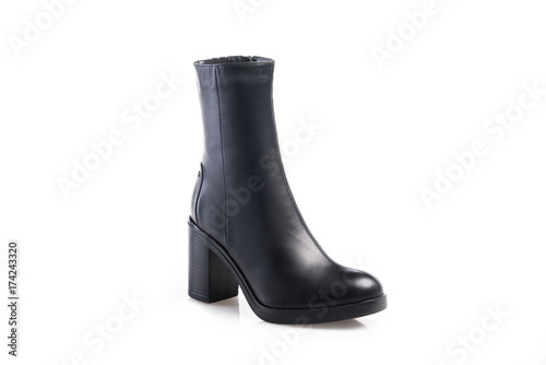 Black suede boot isolated on white background.