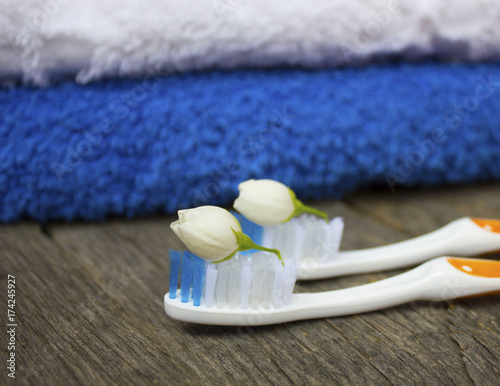 Toothbrush with tiny flowers. Healthcare