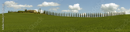 Tuscany panorama with farmhouse and cypresses