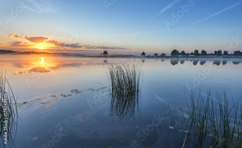 Summer morning at a big river, Europe. Summer holiday and vacation concept
