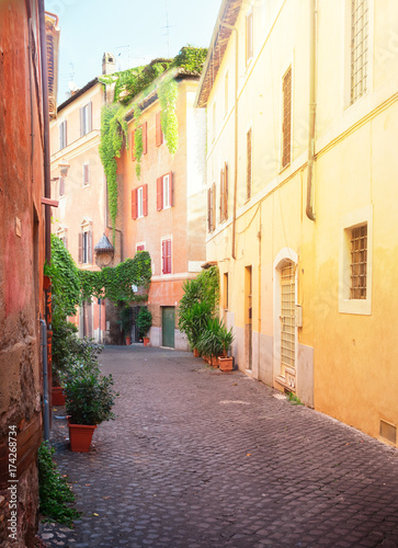 view of old town italian narrow street in Trastevere  Rome  Italy  retro toned