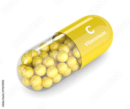 3d render of vitamin C pill with granules photo