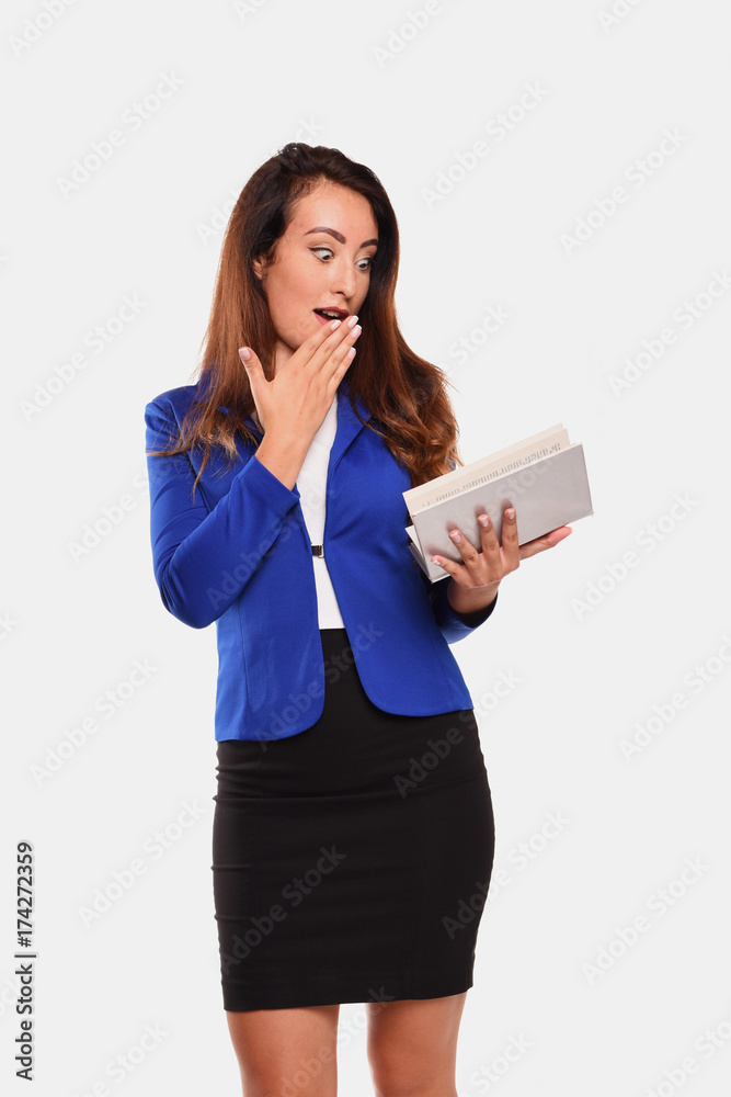 business woman in blue coat and black dress with books business woman in blue coat and black dress with books