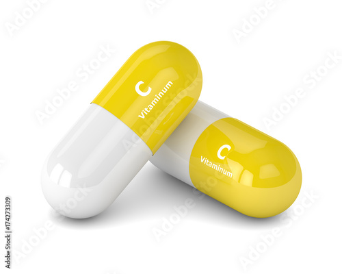 3d render of vitamin C pills over white photo