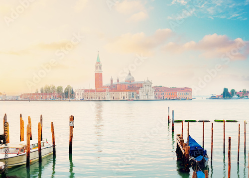 view of lagoon and San Giorgio island in sunrise light, Venice, Italy, retro toned © neirfy