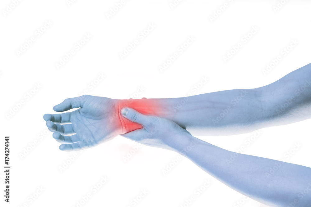 Hands indicate wrist pain. Problem with hand and wrist. Injury, too long writing on the keyboard, overworked. Low saturation photo with red point as ache. Hands indicate wrist pain. Problem with hand and wrist. Injury, too long writing on the keyboard, overworked. Low saturation photo with red point as ache.