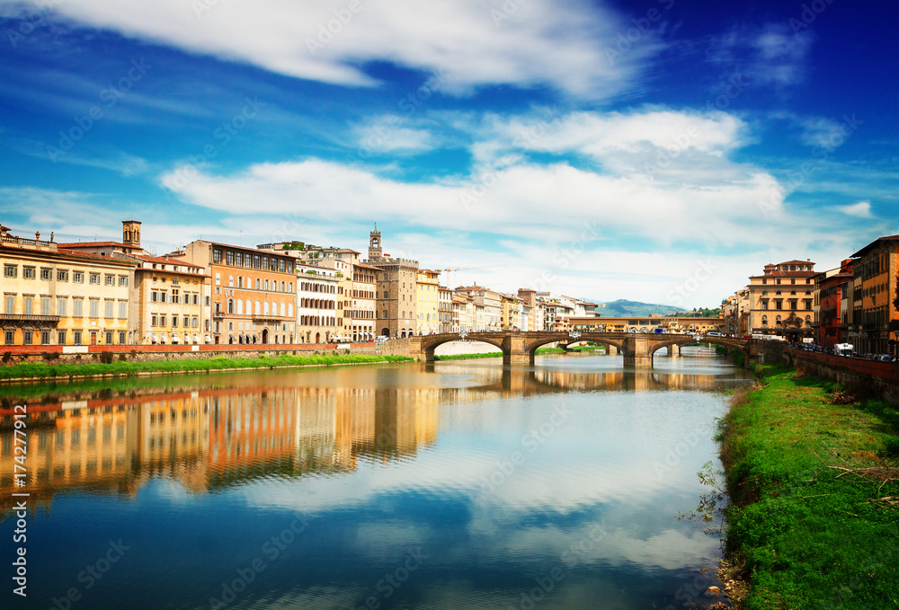 old town, bridges and river Arno reflecting in water at summer day, Florence, Italy, retro toned