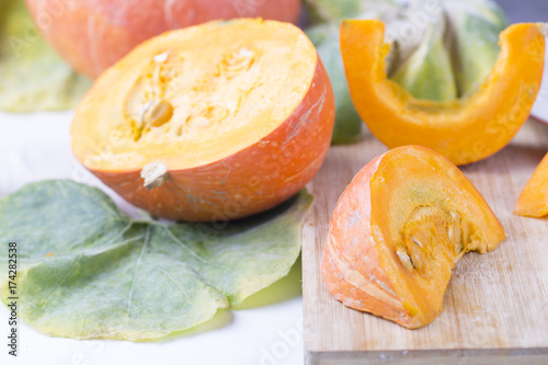 Pumpkin slices on the table. 