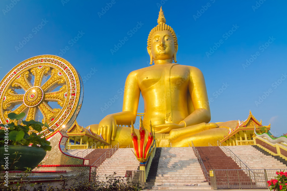 The famous biggest golden buddha statue at Wat muang, Angthong province, Thailand. The famous biggest golden buddha statue at Wat muang, Angthong province, Thailand.