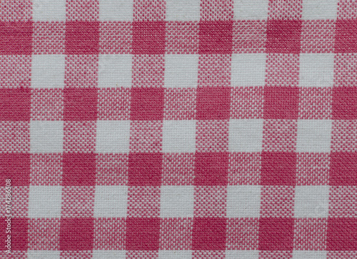 Material for a tea towel or table cloth with a checkered red and white pattern photo