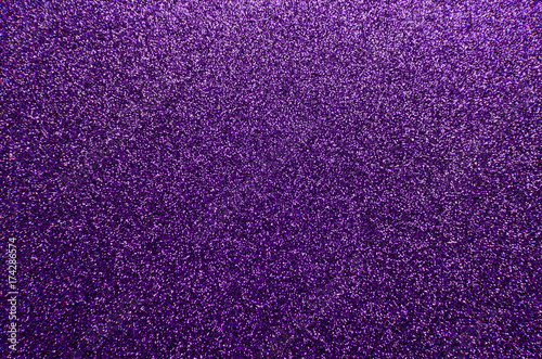 Sparkling and glittering purple background with a festive or party feel