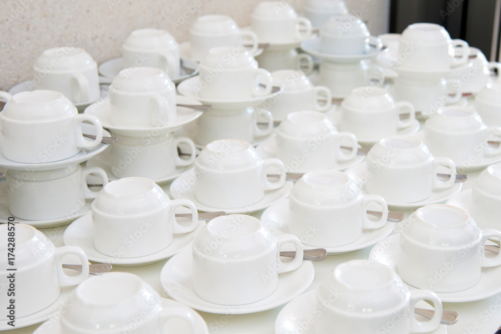 Group of empty coffee cups of white cup for service tea or coffee in breakfast or buffet and seminar event of catering and cocktail Group of empty coffee cups of white cup for service tea or coffee in breakfast or buffet and seminar event of catering and cocktail
