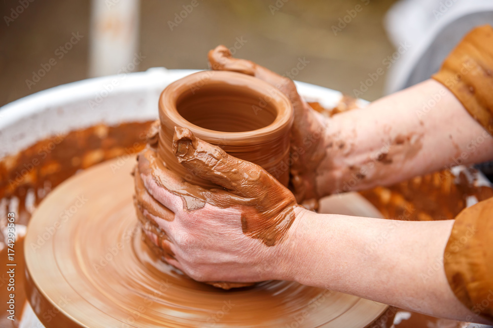 A Potter makes pottery