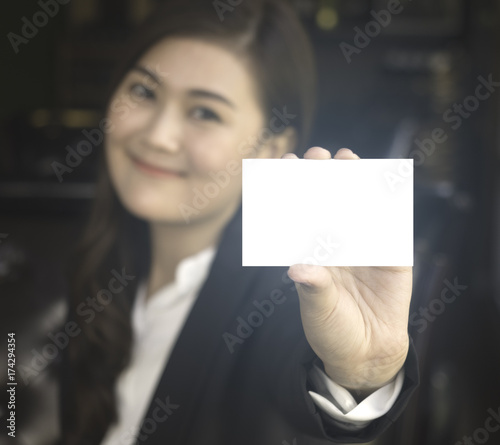 business woman holding blank card with clipping path