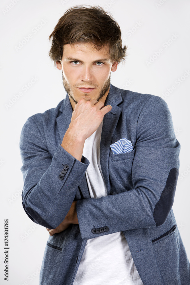 caucasian man wearing white shirt and trendy hairstyle caucasian man wearing white shirt and trendy hairstyle
