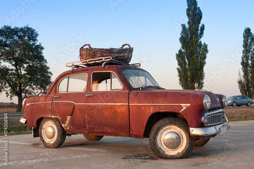 Photography Old vintage car Moskvich 407 standing in the street.