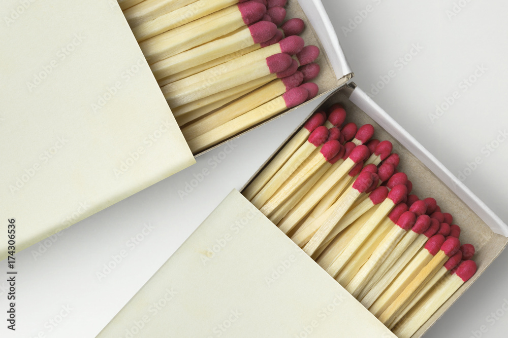 Closeup of two matchboxes, isolated on white Closeup of two matchboxes, isolated on white