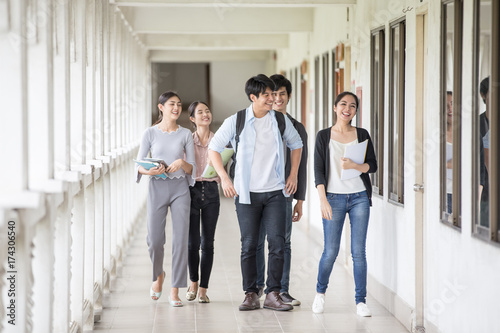 Group of Asian Student walking to classroom together. People with Education concept.