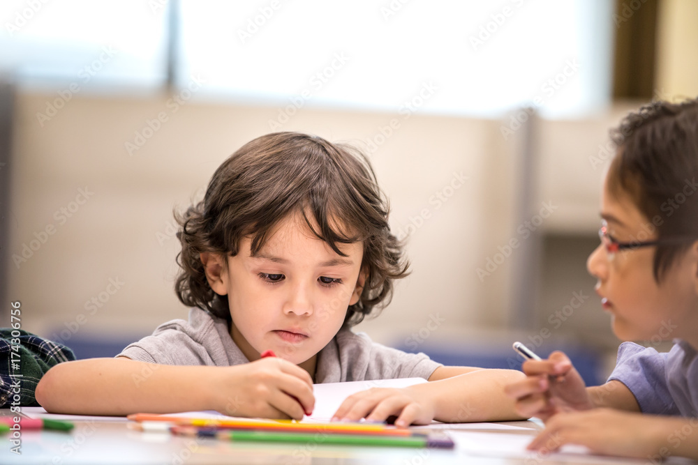 Portrait of boy learning at classroom together, Children with education concept. Portrait of boy learning at classroom together, Children with education concept.